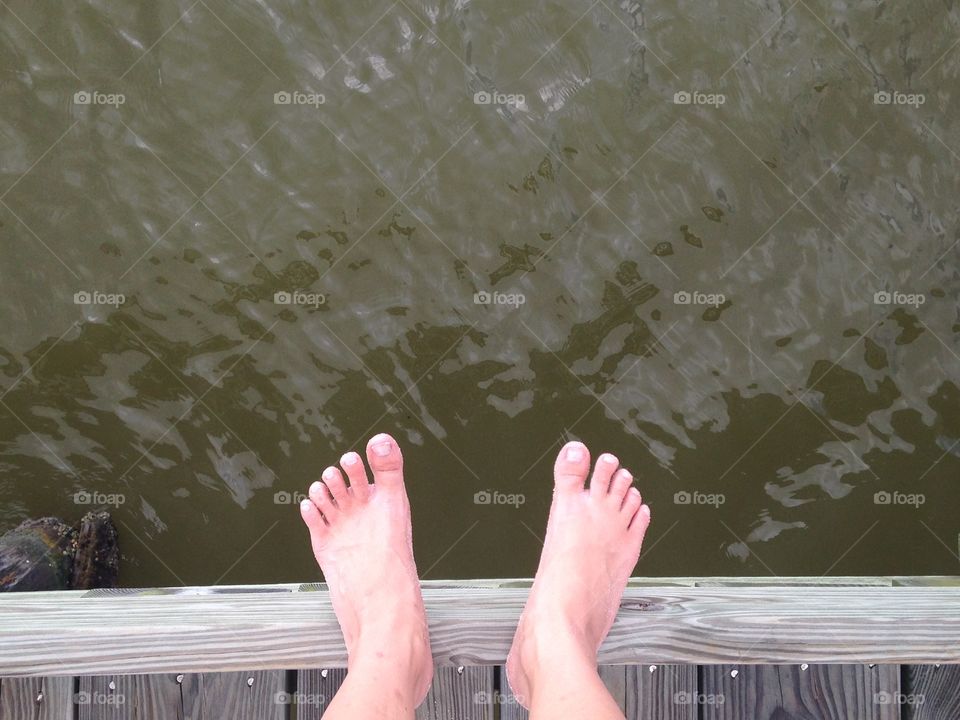 Feet overlooking coastal Biloxi water