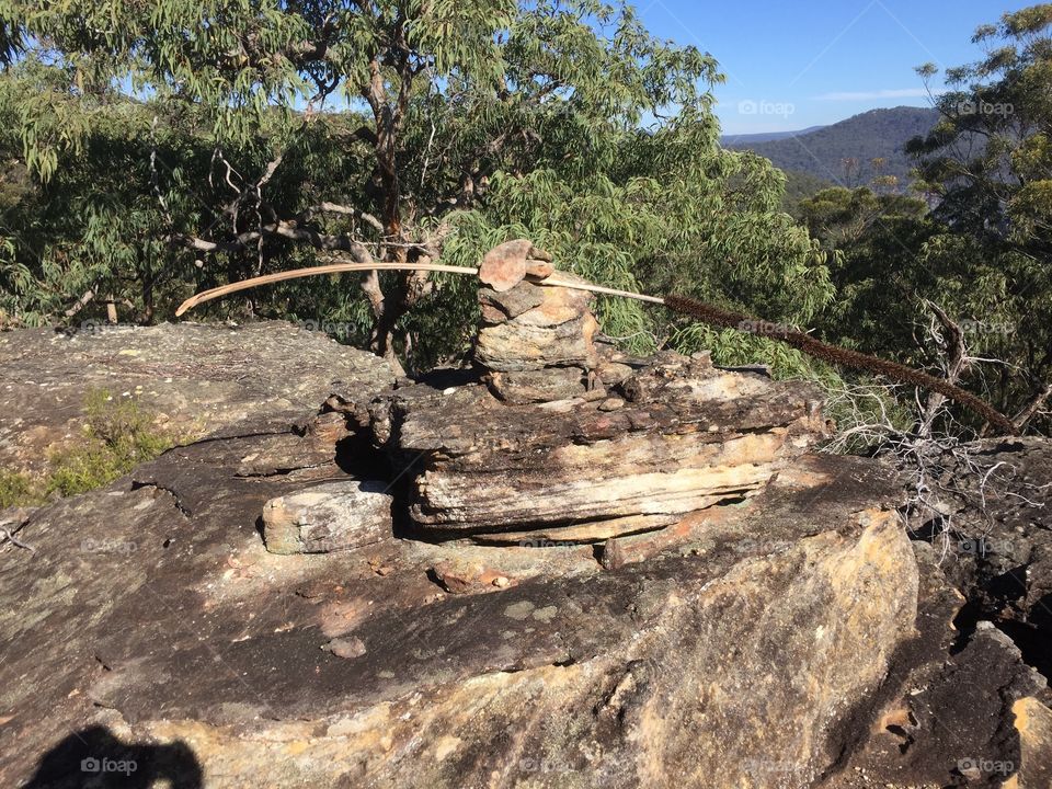 Stack of rocks near edge of cliff