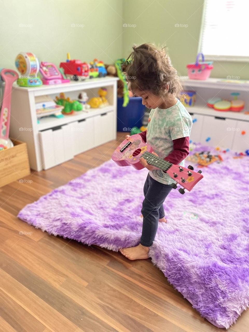 Toddler playing pink guitar, toddler rocks out with guitar, toddler and pink guitar, Nirvana loving baby, baby rocking out with guitar, toddlers and musical instruments, pink guitar and baby girl, toddler learns to play guitar 