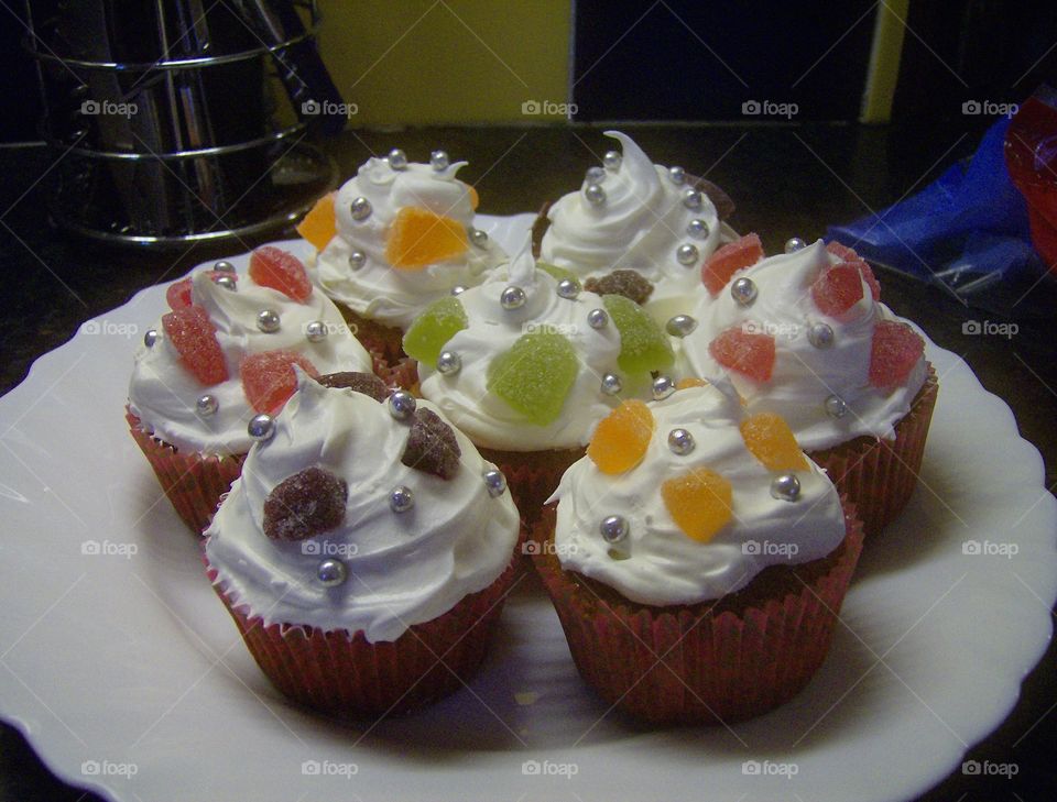 Cupcakes With Marshmallow Frosting And Jelly Fruits And Silver Balls Decorations - White Icing - Baked Goods