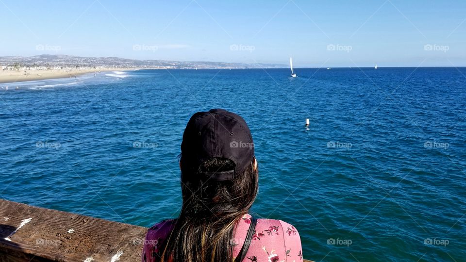 girl looking out the sea