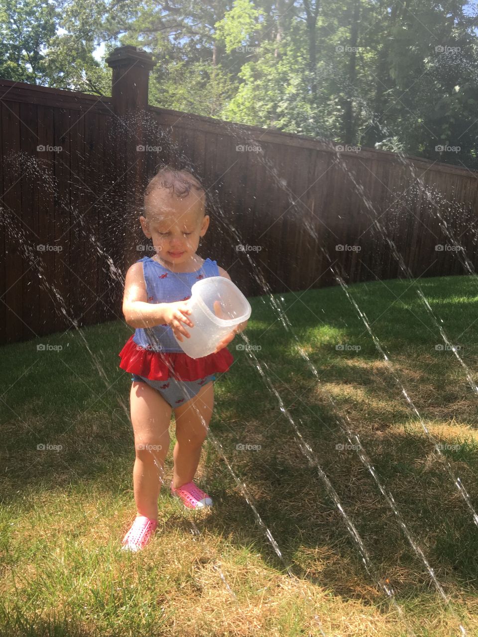 When you're air conditioner goes out and the heat index is 105 degrees, you HAVE to play in the sprinkler