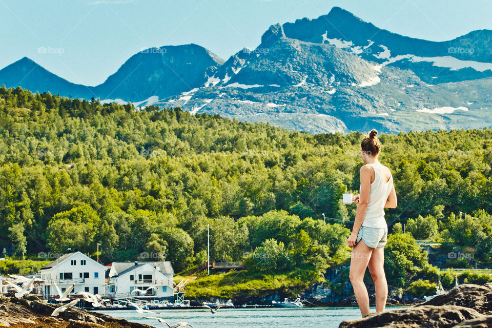 Woman enjoying mountain view in north Norway 