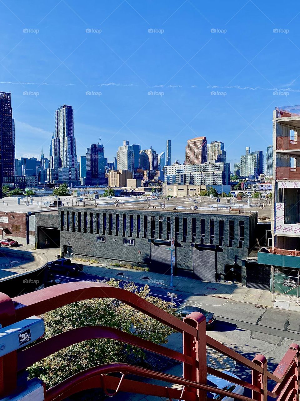 This is the view from the top of the staircase on the „Greenpoint“, Brooklyn side of the „Pulaski Bridge“ at „Newtown Creek“ in LIC, Queens. The bridge connects „Queens“ and „Brooklyn“. 2023. Hypnotic Productions