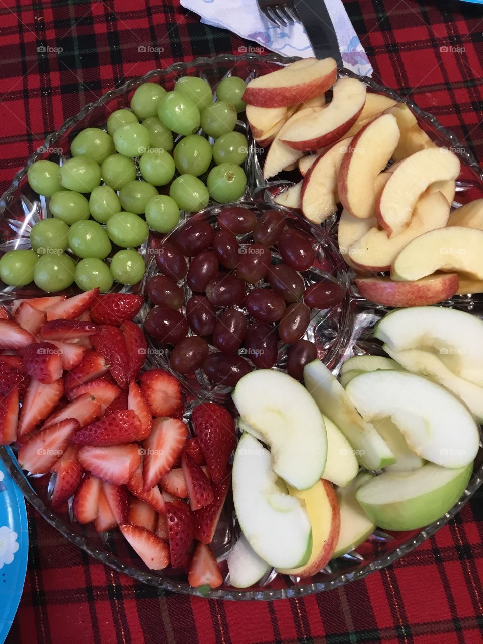 F - Fruit Colorful and healthy fruit tray to snack on. Rich in vitamin C. Green grapes, red grapes, green apples, red apples and strawberries