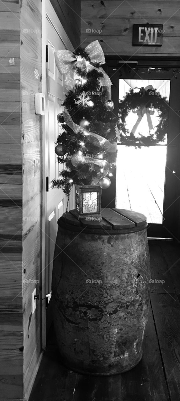Circles, circles and more circles! Wreath, Christmas tree ornaments, and top of barrel. Photographer from the South Georgia woods. 