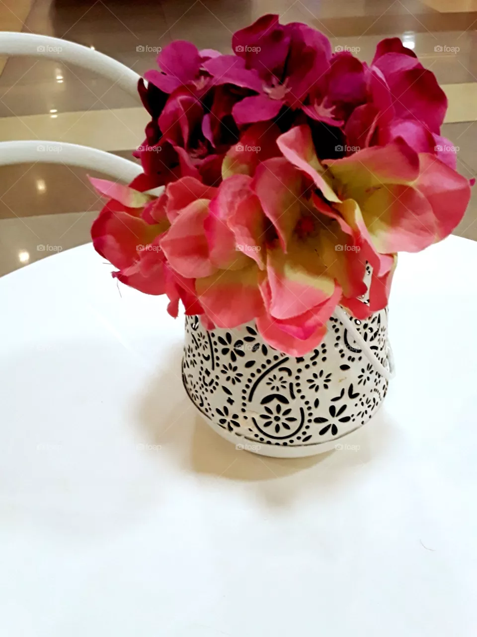 pink bunch of flowers on a white table