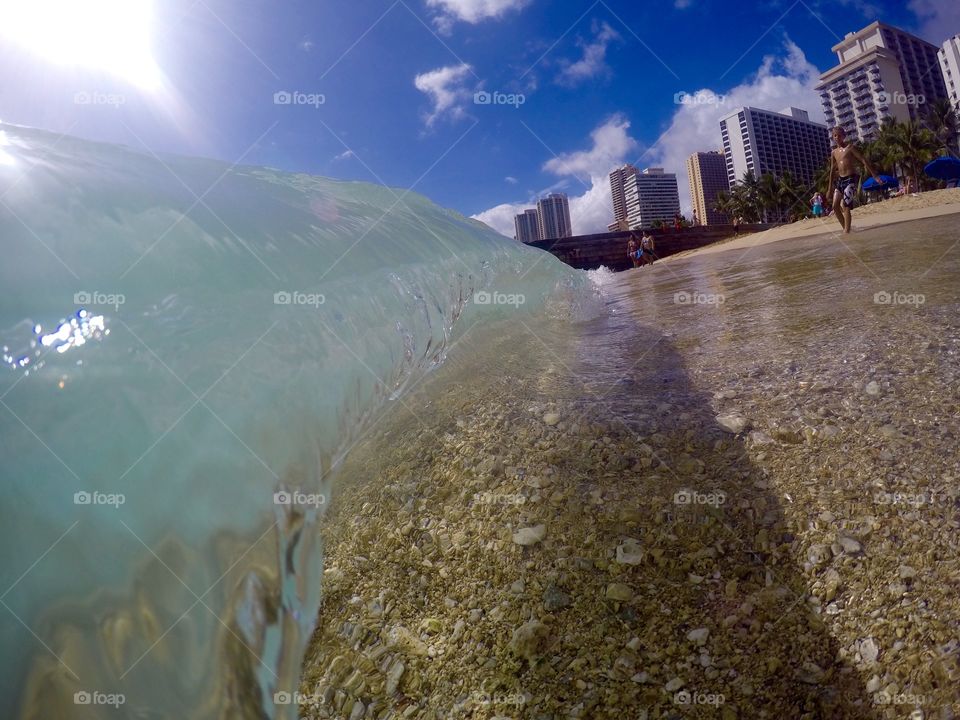 Glass wave Waikiki. Glossy glass barrel 
