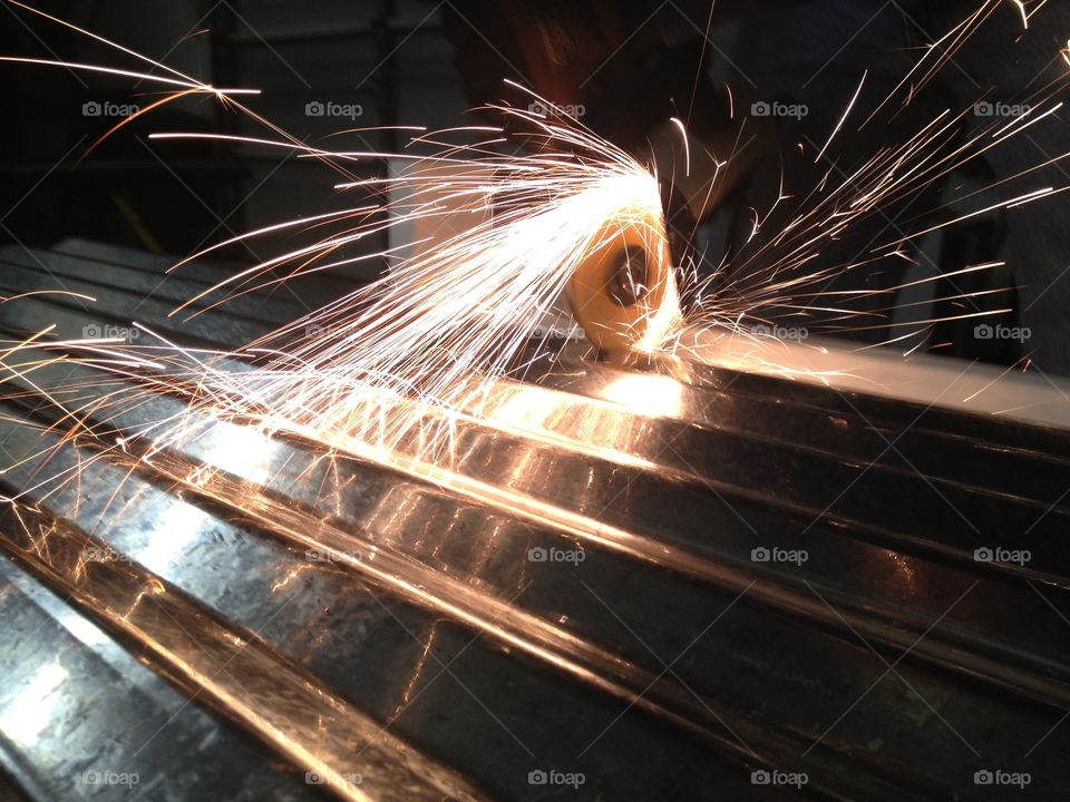 Metal grinding on steel pipe