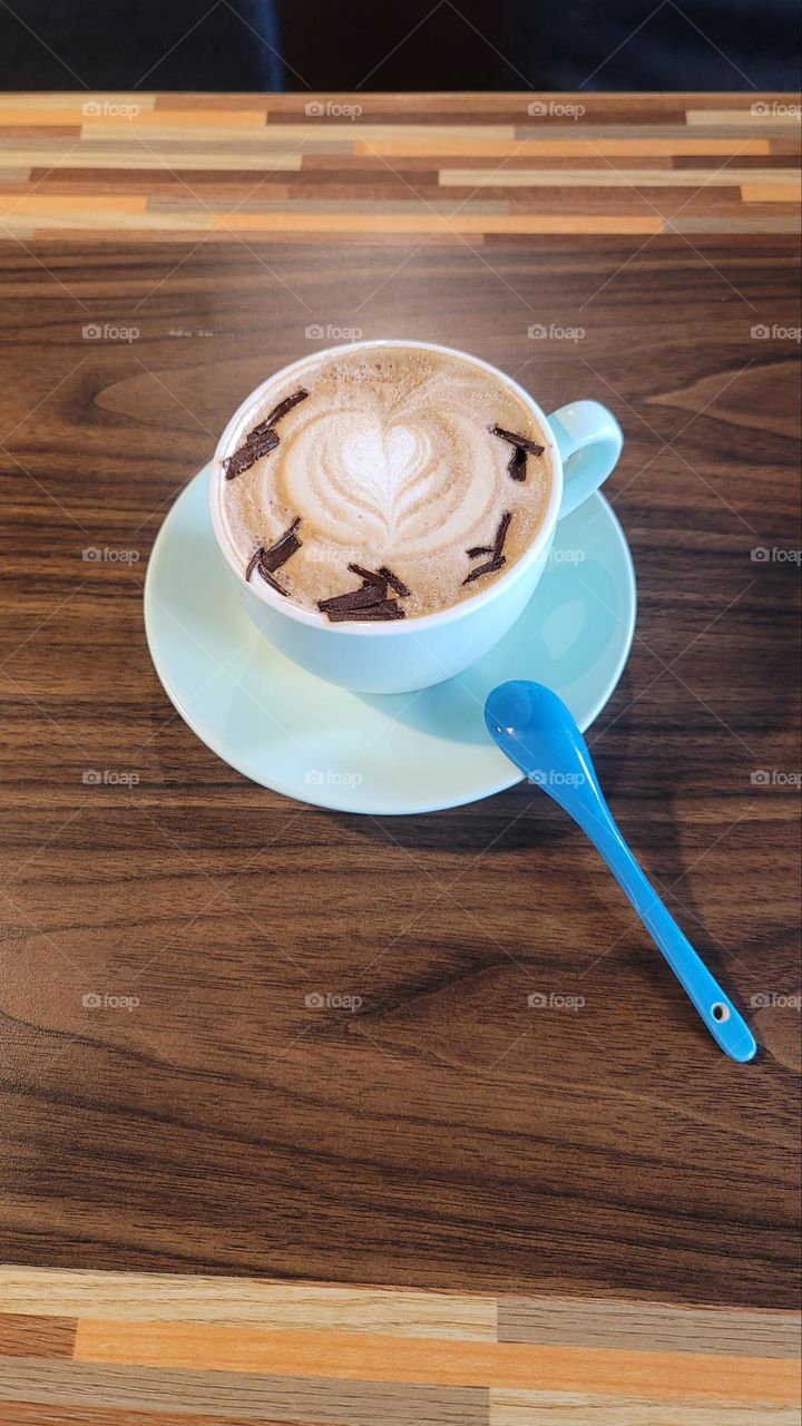 Latte with latte art and chocolate