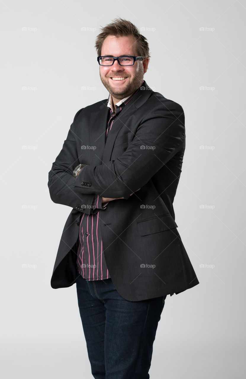 Young business man smiling.