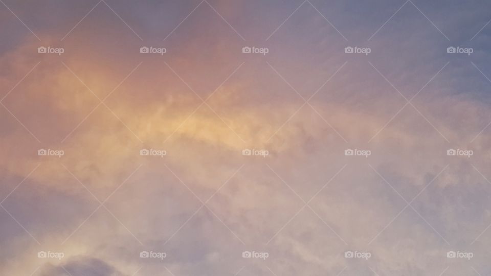 Pink, orange and blue sky at sunset