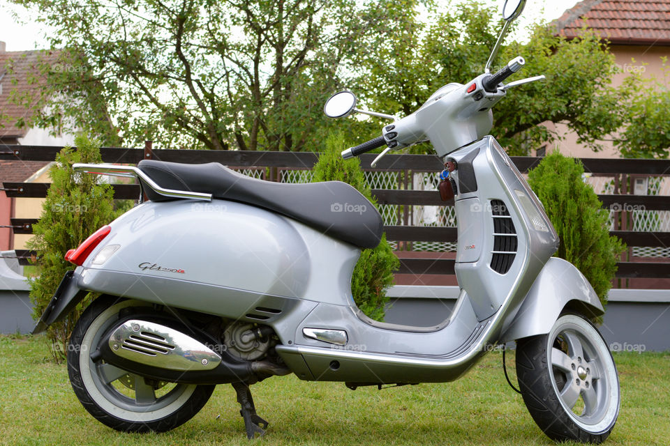 grey vespa motorcycle, italian style