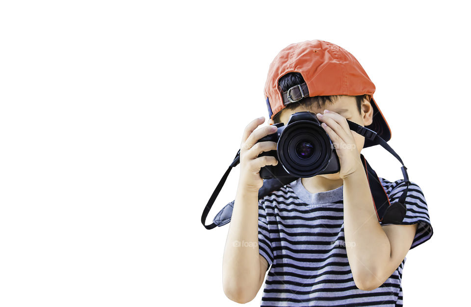 Isolated Hand boy holding the camera Taking pictures on a white background with clipping path.