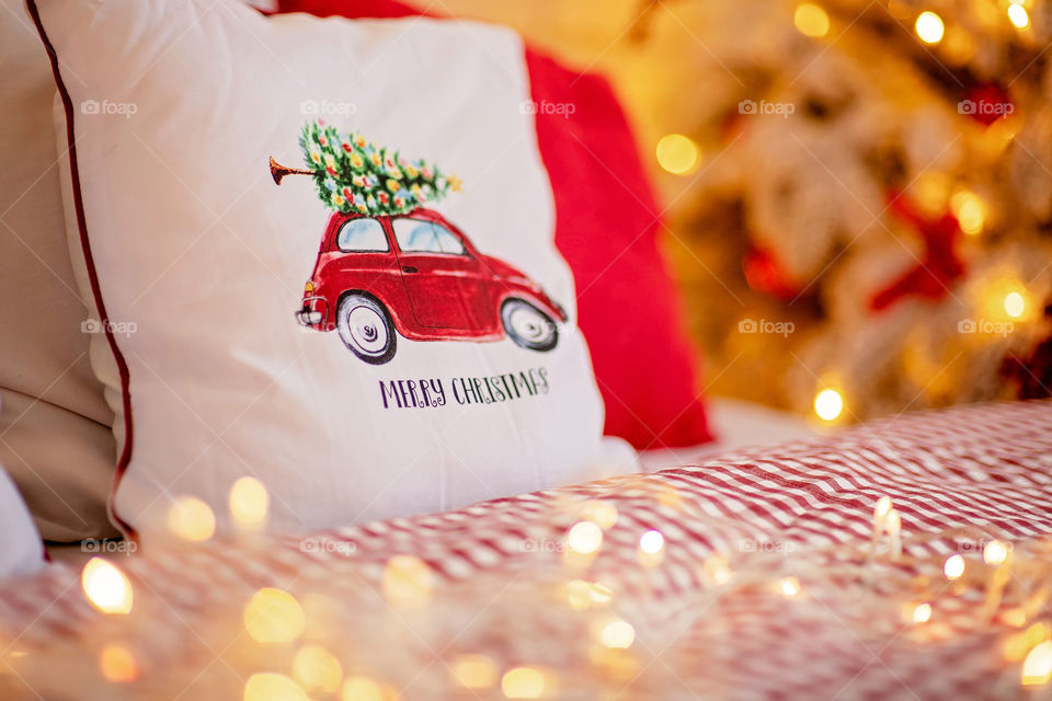 Christmas decorated pillow, festive atmosphere. Home decor.