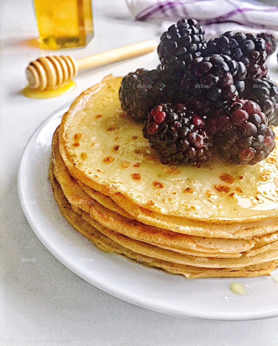 Today for breakfast is blackberries and homemade pancakes drenched with honey 