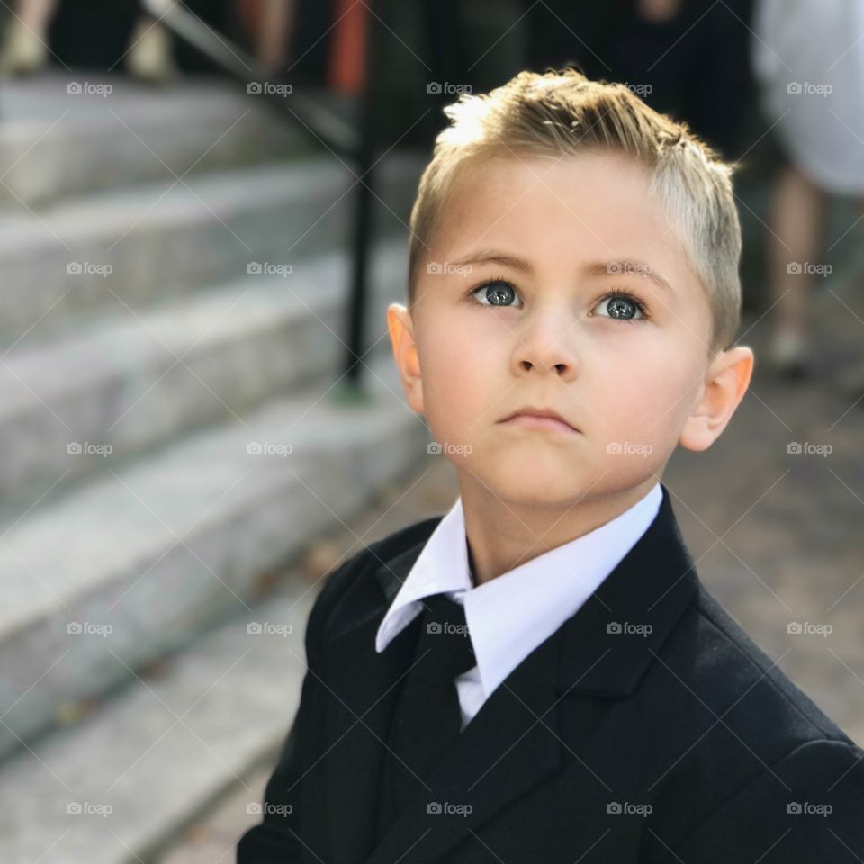 Serious about his ring bearer duty