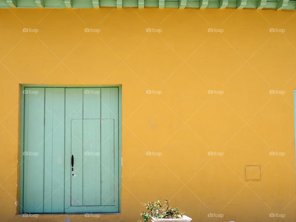 Colorful house wall in the old town of Havanna, Cuba during summer.