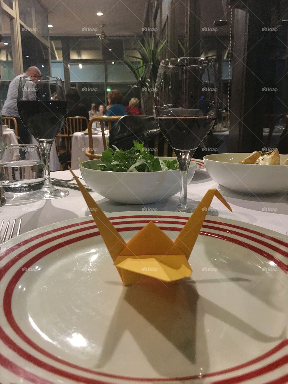 Origami crane, Japanese dinner place setting in restaurant 
