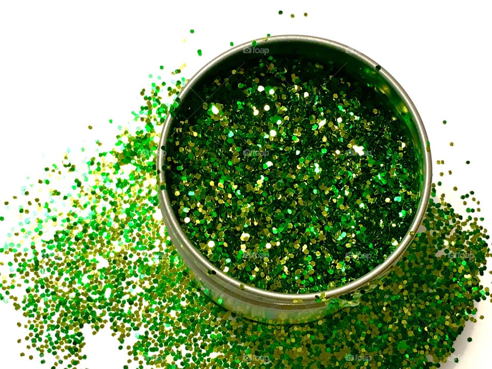 Green sequin in container