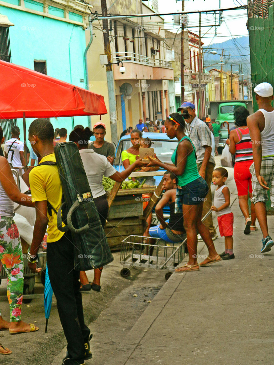 Cuban Street Market. This is a photo of one of many street markets in Santiago de Cuba. Anything from food to music is sold on narrow streets