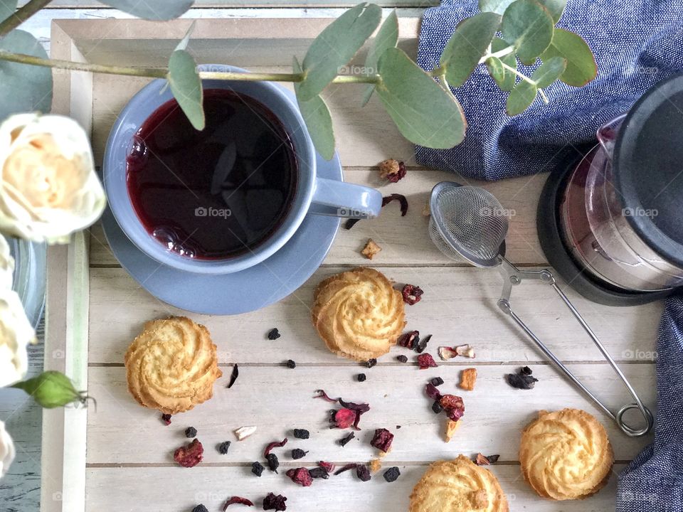 View of tea cup with jar