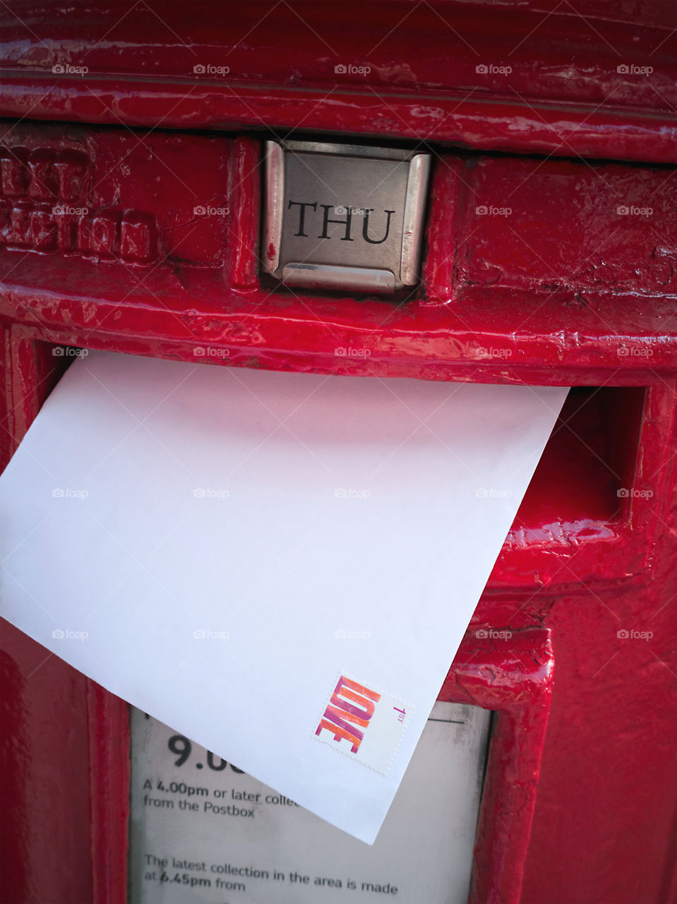 A red post box.