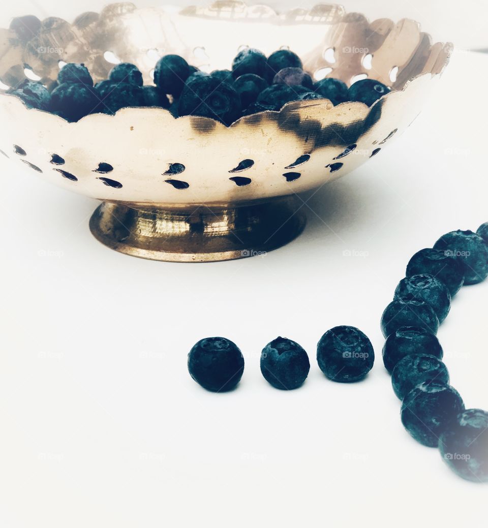 Blueberries with gold bowl 