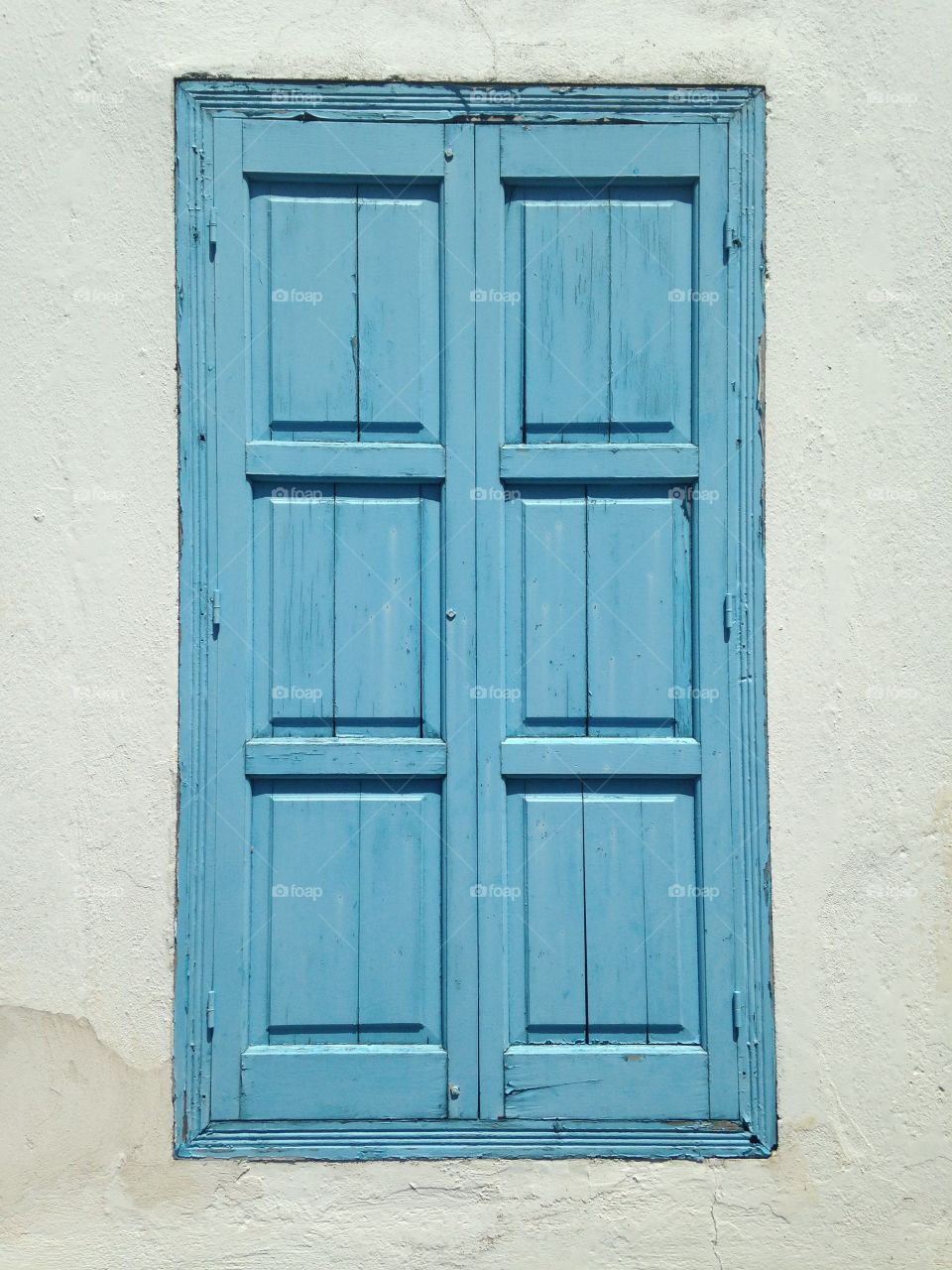 Glossa Shutters. Baking hot day in Glossa on Skopelos. Anyone sensible is behind closed shutters. 