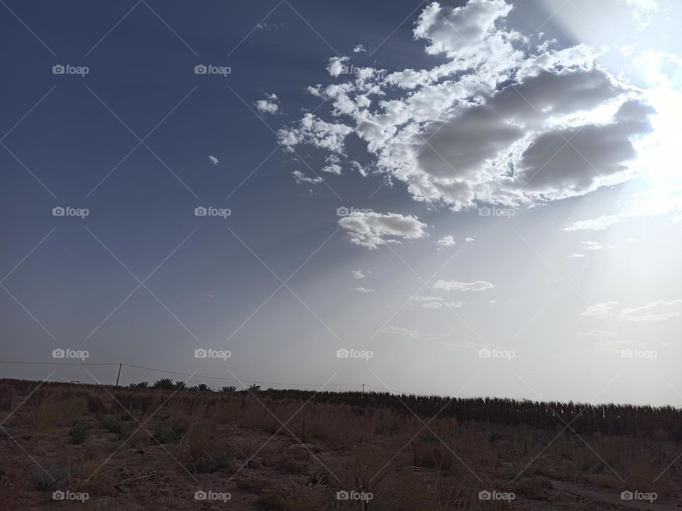 the sun that disapears between clouds