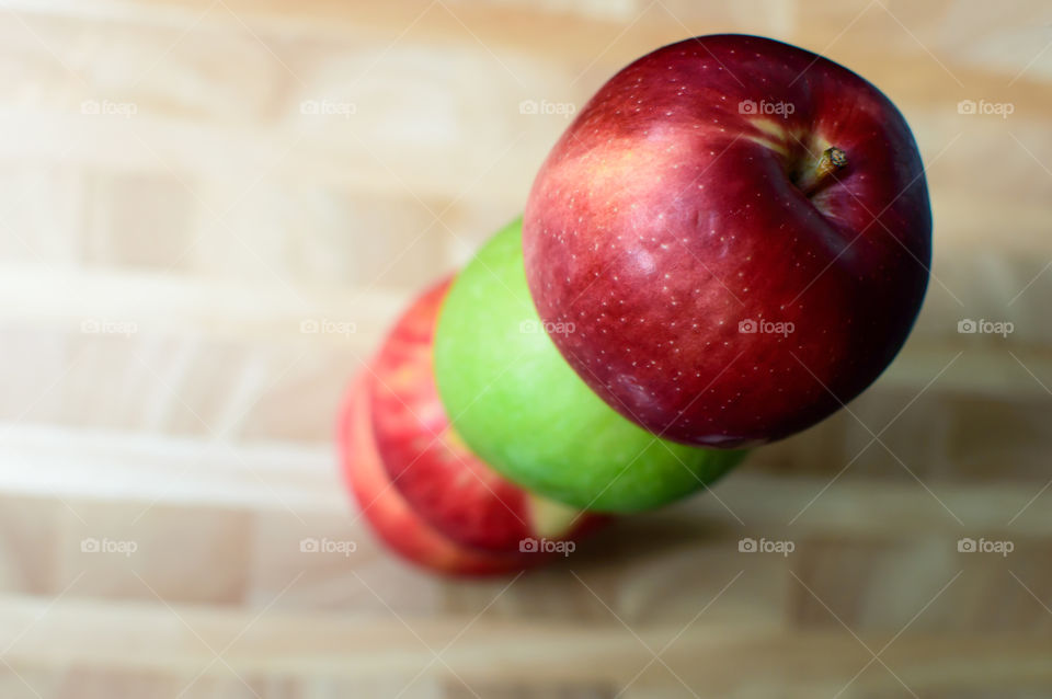 Stack of red and green apples