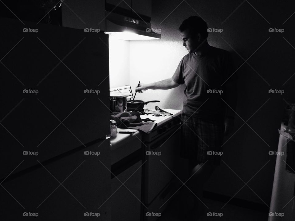 Man Cooking in Kitchen