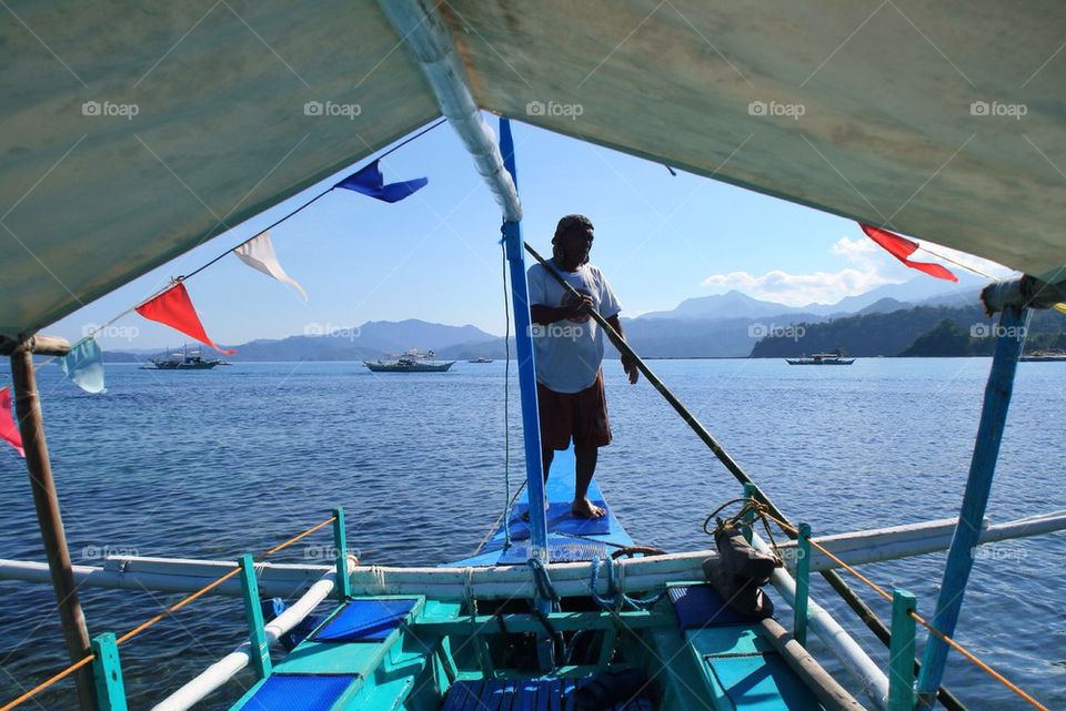 A boat man in El Nido