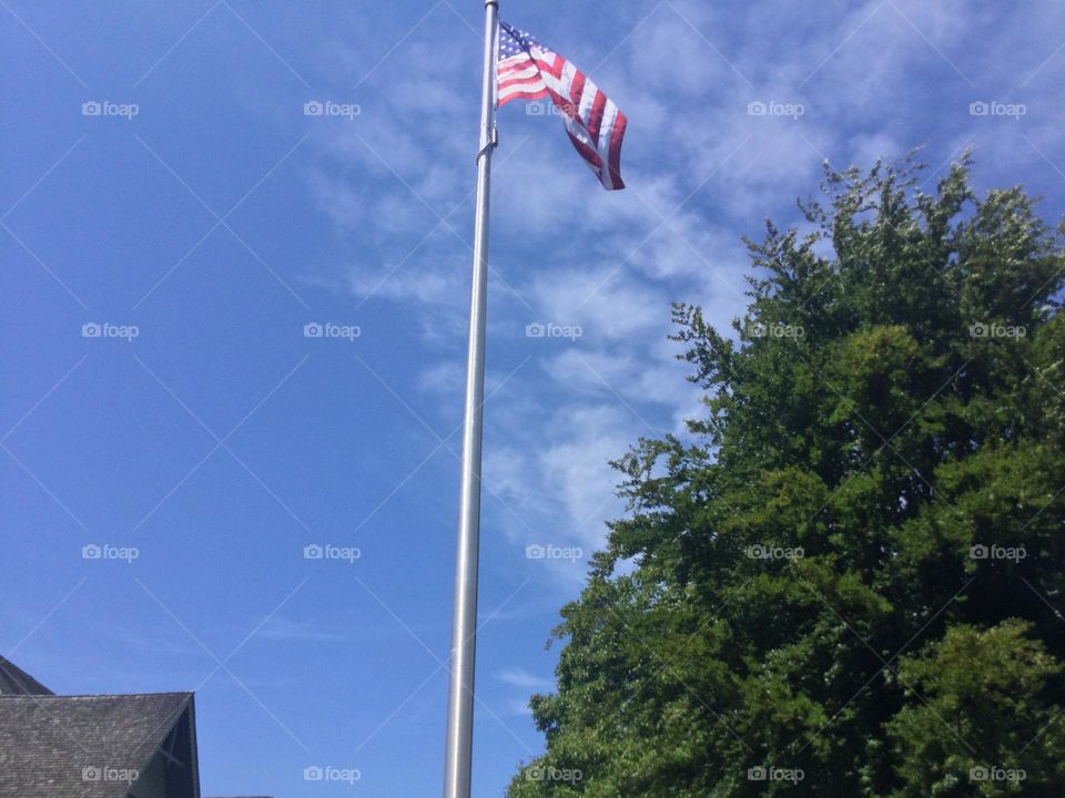 The American Flag Flying in the Wind