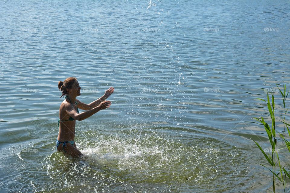 woman in water lake relaxing love summer