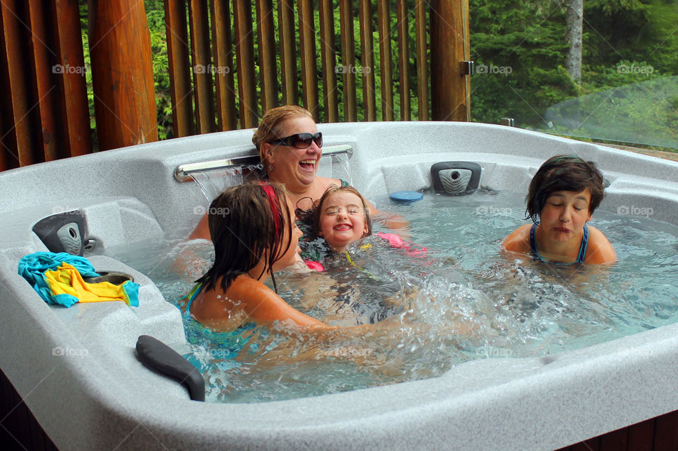 Summertime is for going to Tofino! We usually go every year and stay at a lovely place with outdoor hot tubs. After playing in the cold Pacific ocean a hot tub definitely feels good & revives us; as shown by the smiling and goofy faces!  🛀
