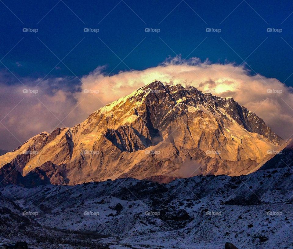 The clouds of Mt. Everest crown Nuptse. Photo taken on the Everest Base Camp Trek in Nepal.