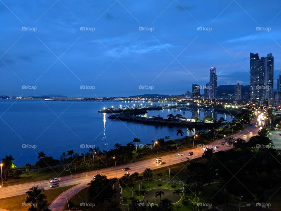 Evening view of Panama City, Panama overlooking Panama Bay.