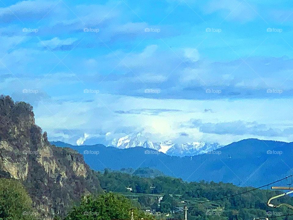 Village.  Open spaces.  Small Italian villages in the mountains.  In the distance the mountain was covered with snow