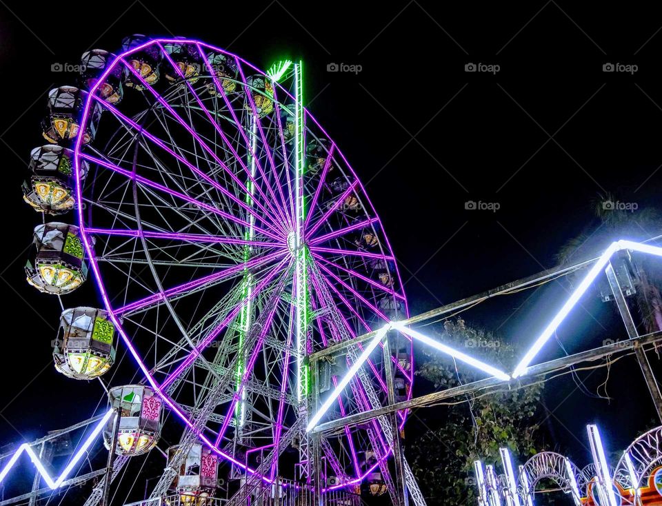 Ferris wheel festival purple lighting