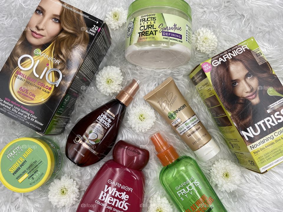 Beautiful Garnier Product flat lay with flowers