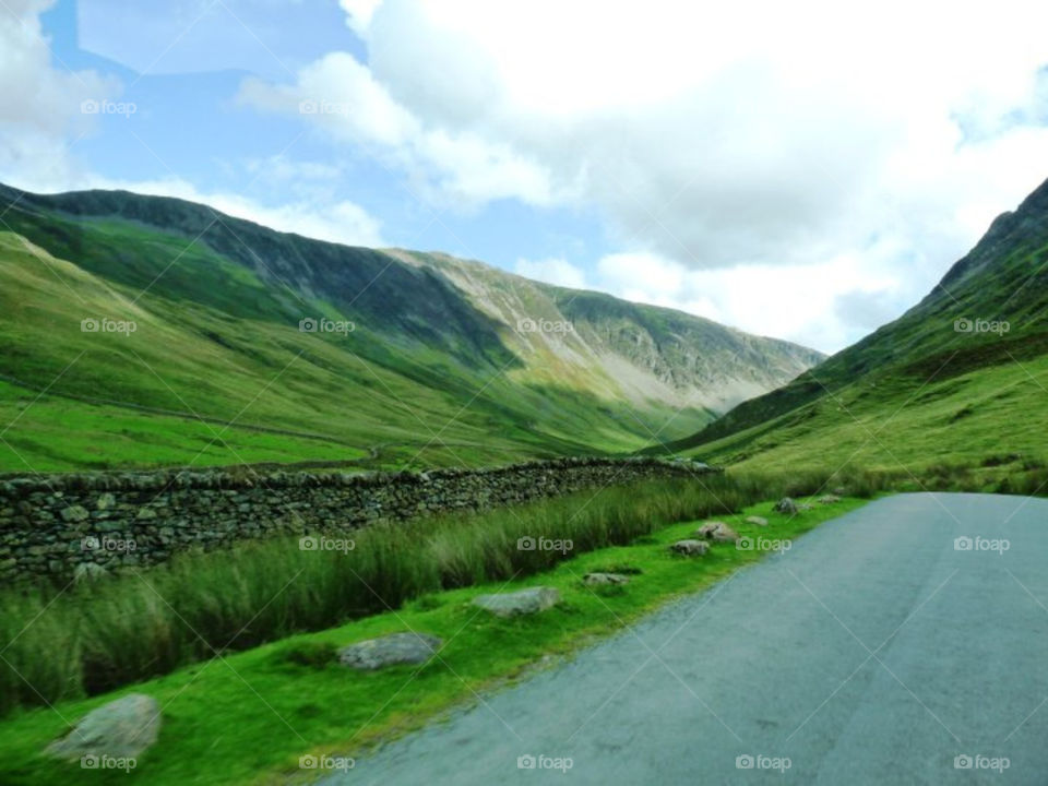 green wall road stone by llotter