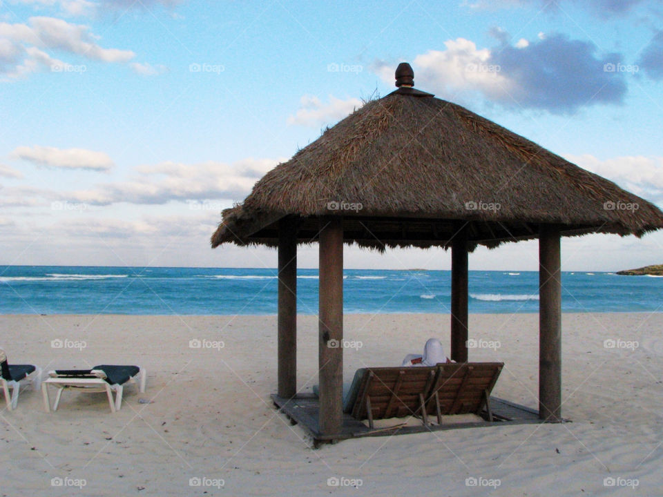 chair clouds sky blue sand beach by angeljack