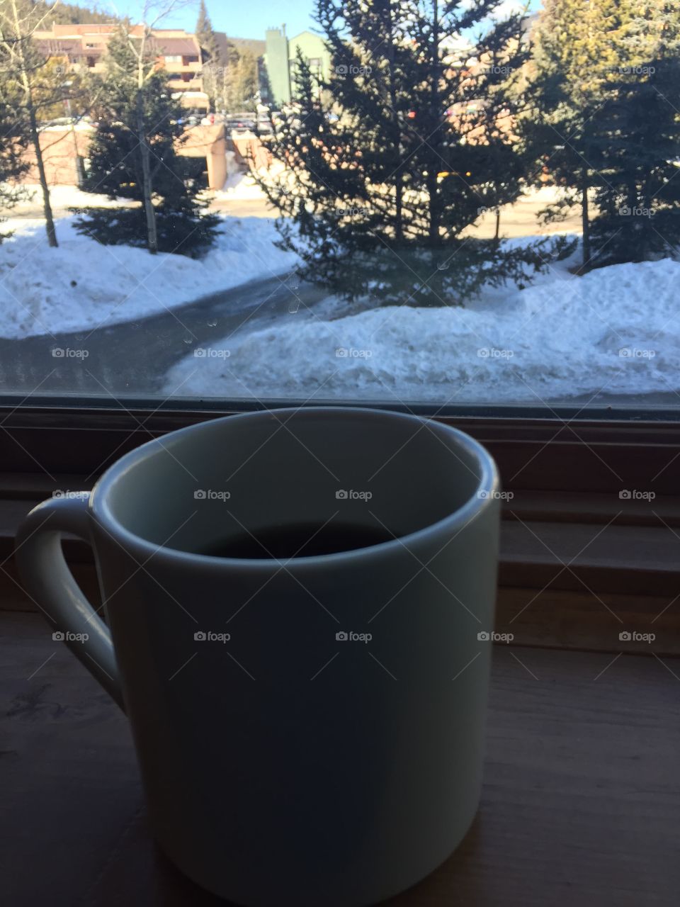 Cup of tea inside during a snowy day