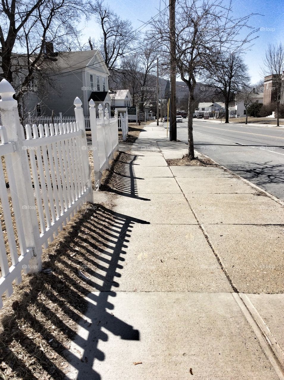 Empty side walk in city