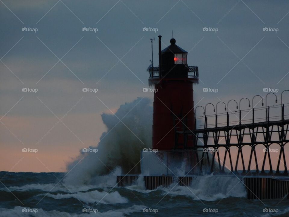 winter waves at the lighthouse. winter waves at the lighthouse