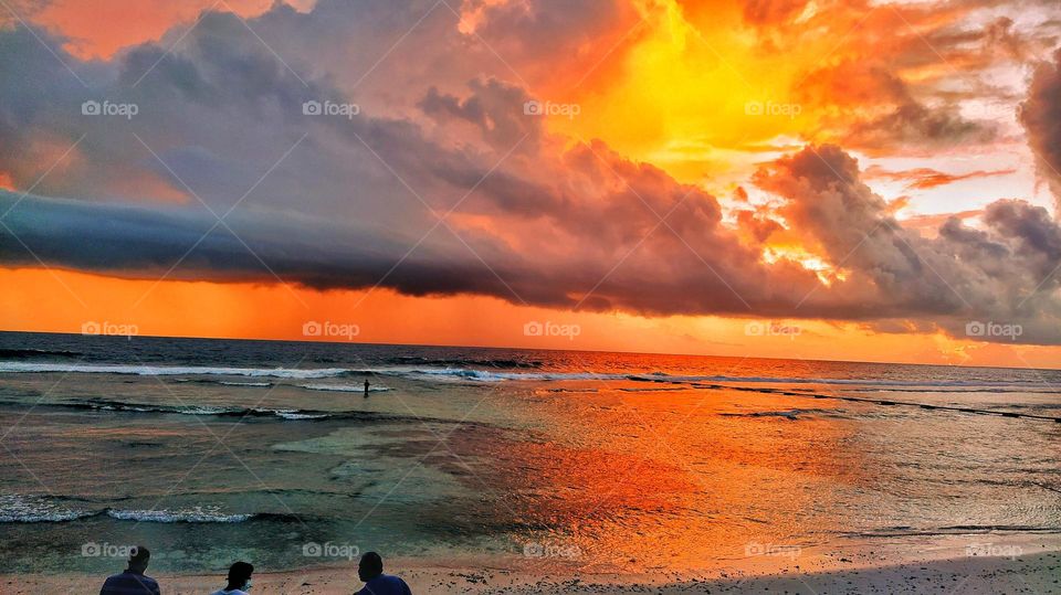 Magical sunset in one of the seabeaches of Fuvahmulah island Maldives.