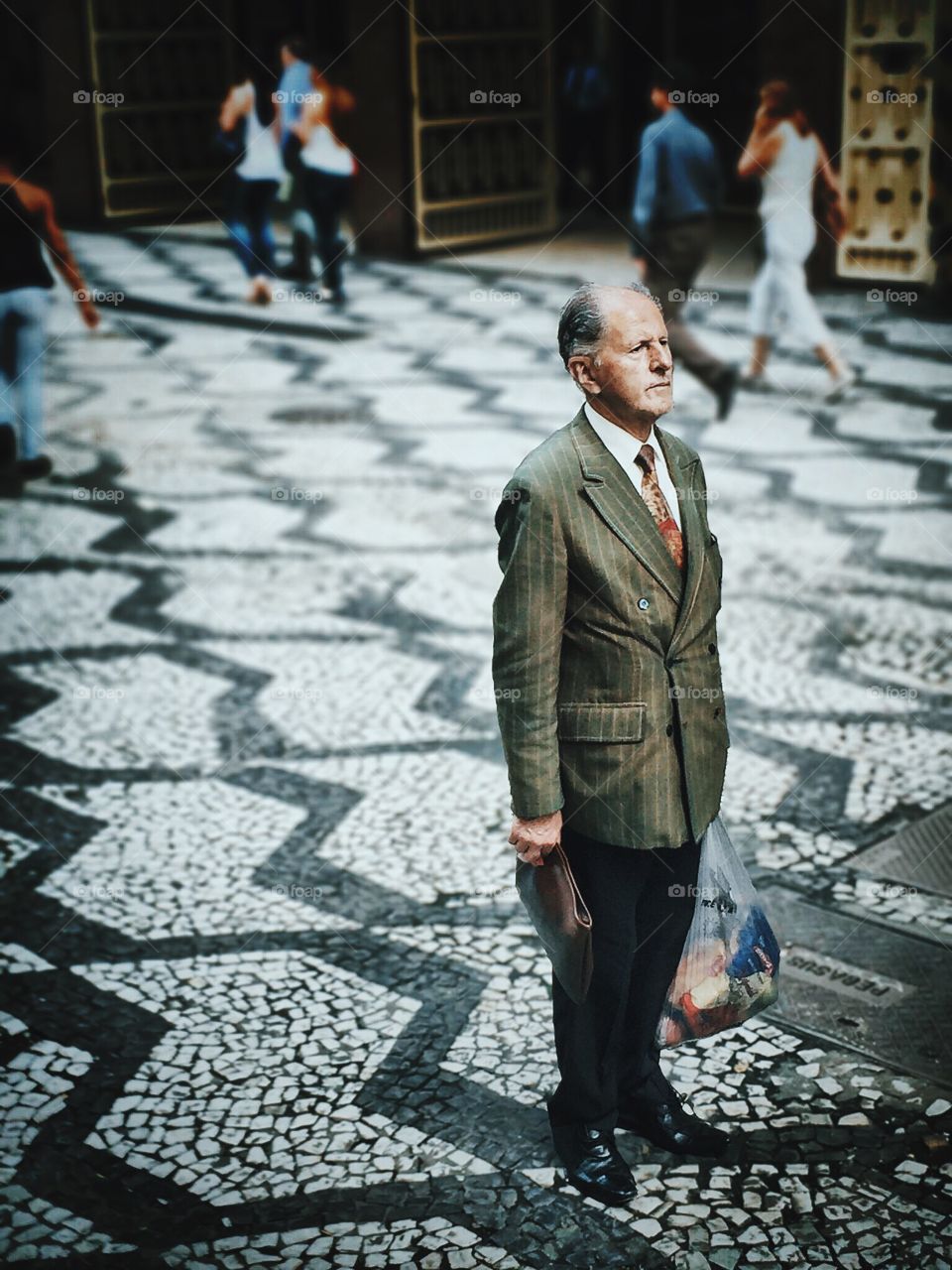 A man waits for his bus in São Paulo downtown. 