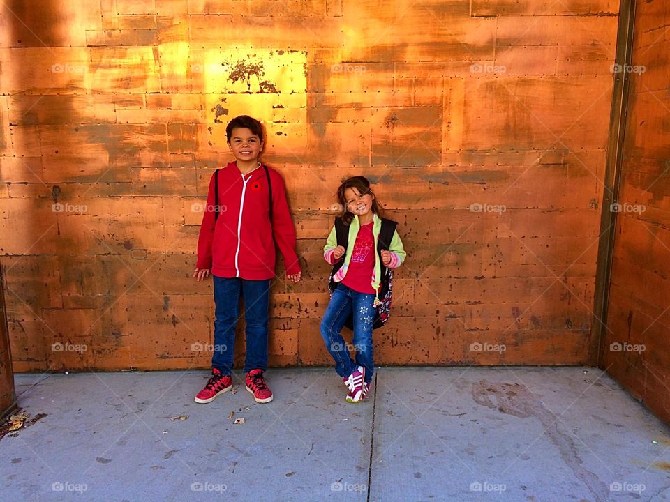 Kids on a copper wall 