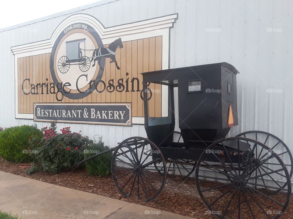 Restaurant Sign with Horse Buggy